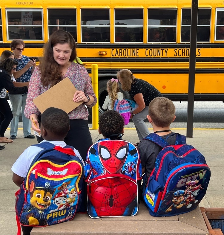 students with backpacks, teacher