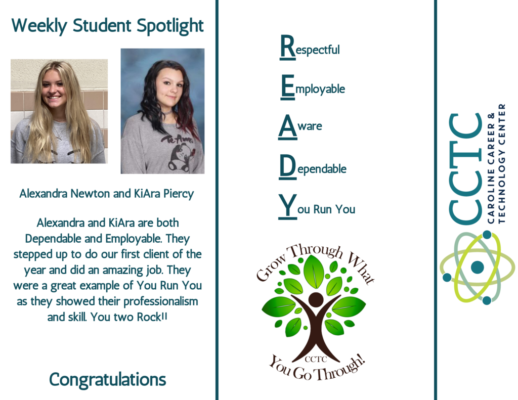 2 students and spotlight