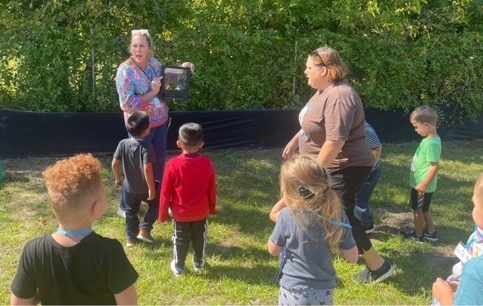 teachers and students playing outside