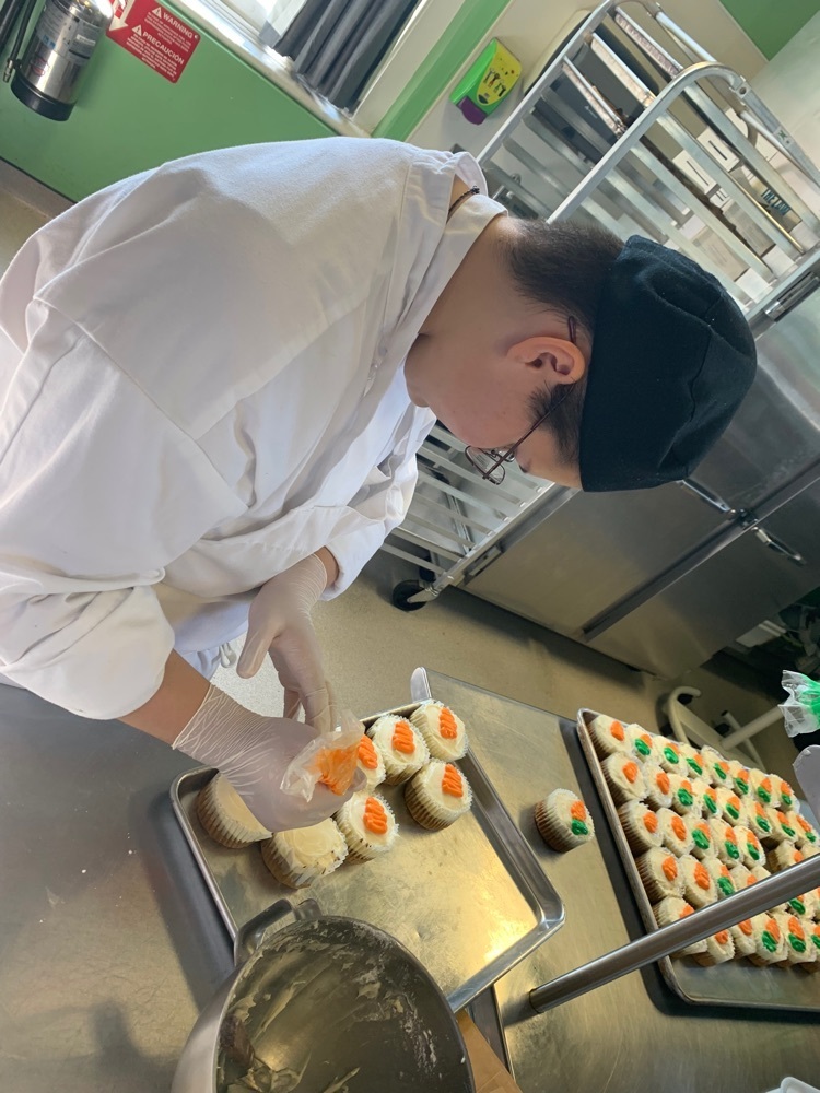 students making cupcakes