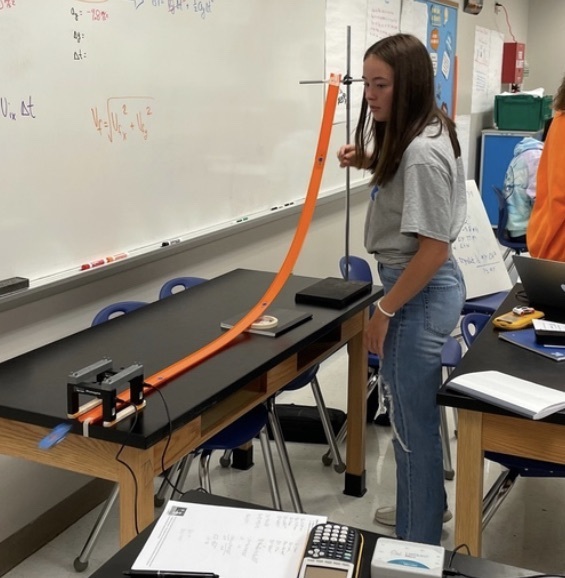 student with project