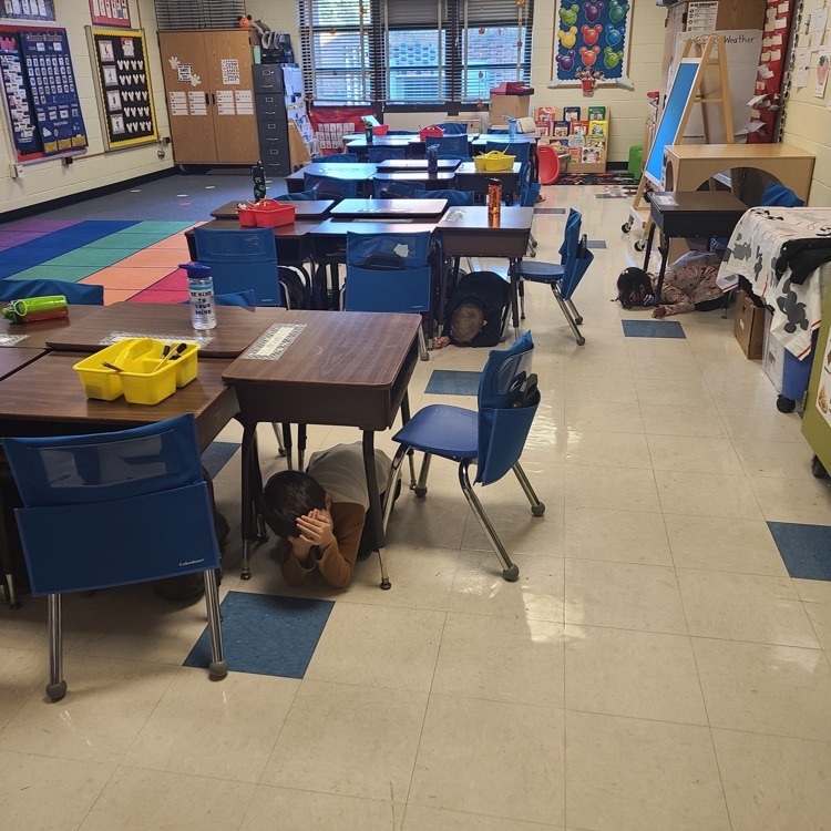 students under desks