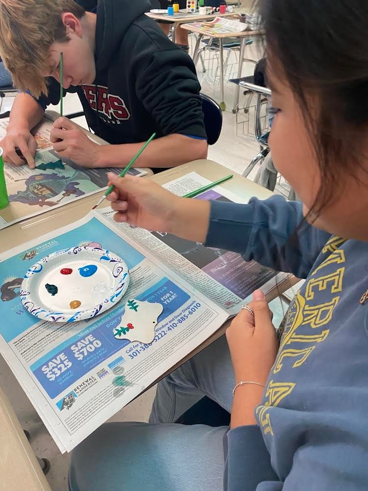 students painting