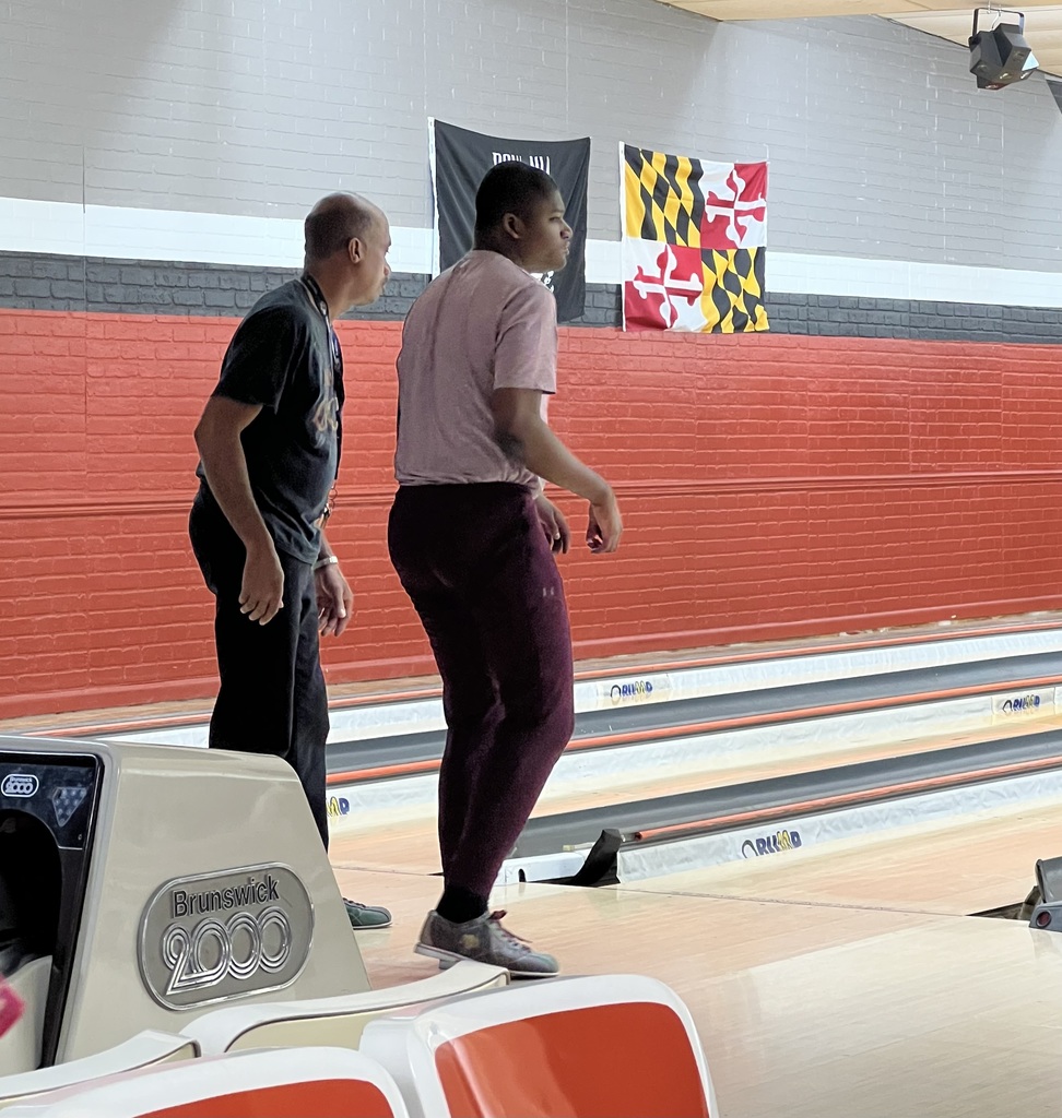 two people bowling